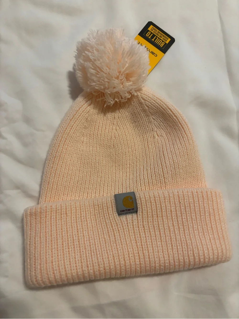 Carhartt Women’s Knit Pom Pom Cuffed Beanie Peach Pink NWT One Size